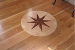 White oak classic style, featured in an art galleryl, 6-10in nom random widths, and up to 12' long - with plugs