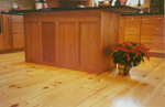 This floor features CHERRY plugs in a white pine floor! Very creative! And over radiant heat!